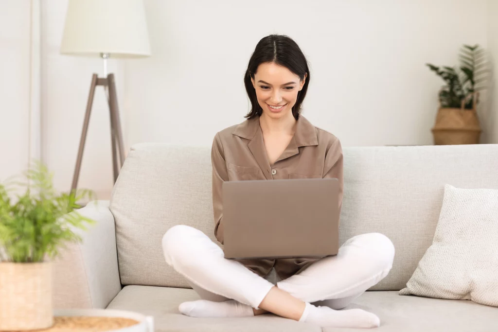 young-girl-working-on-laptop-online-at-home-2022-12-16-06-51-51-utc